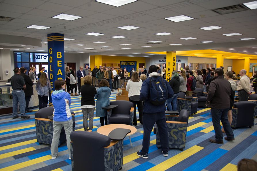 A crowd gathers in the Learning Commons.